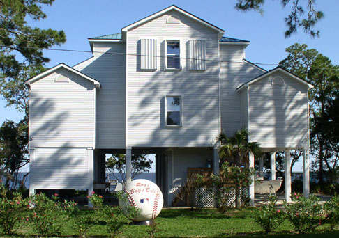 House with giant baseball in the front yard along U.S. Highway 98 in the Florida Panhandle