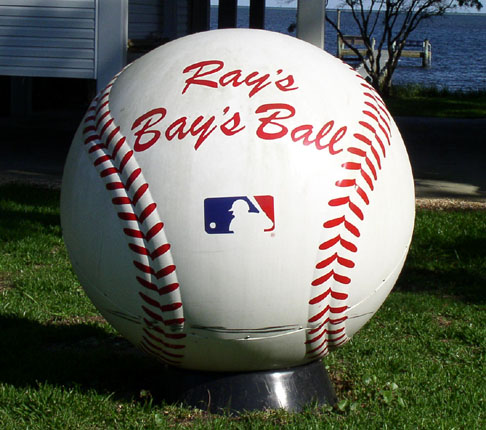 House with giant baseball in the front yard along U.S. Highway 98 in the Florida Panhandle